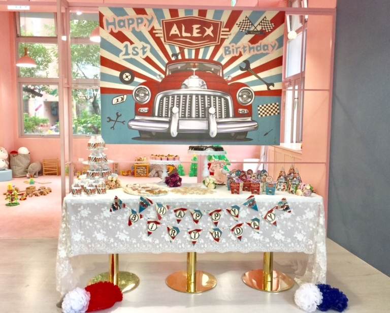 car banner and dessert table