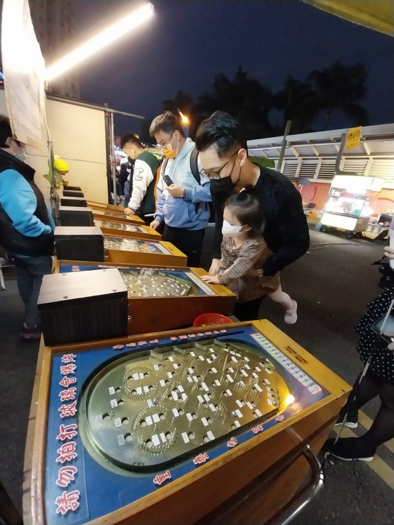 I saw this in Taiwan and it is brilliant. We wouldn't have bought the Taiwan sausage if not for the game! (And I was full with other street food!)