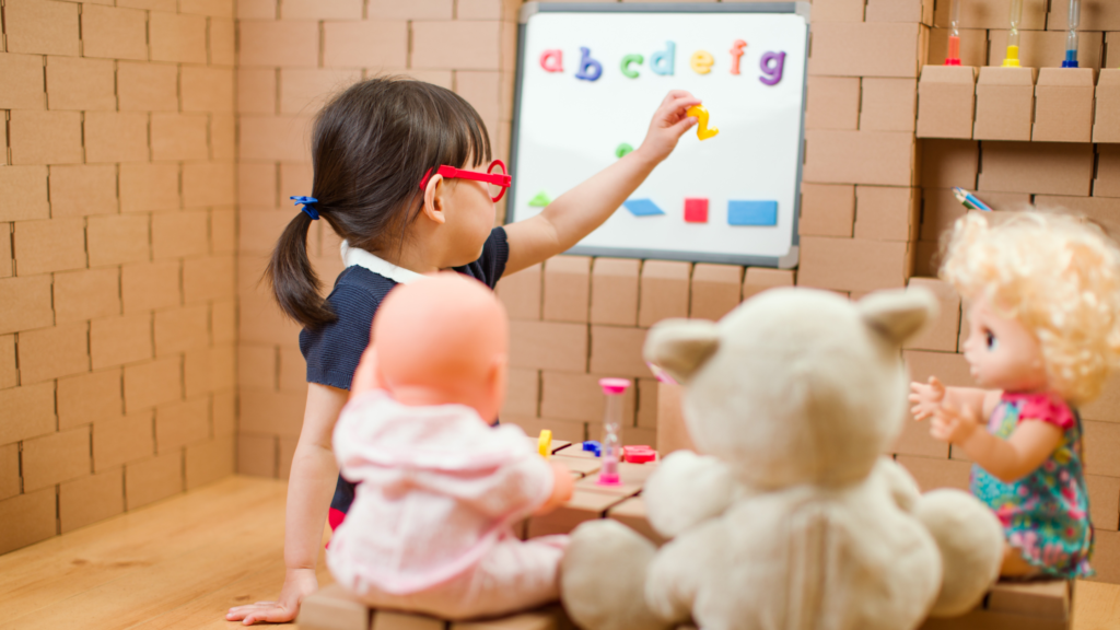 Kids at work pretending to be a teacher 