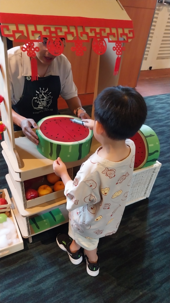 fruit stall- watermelon cutting